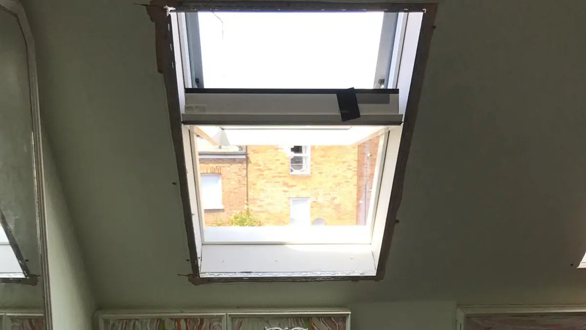 Velux roof window installation in a London loft by City Building and Roofing Ltd