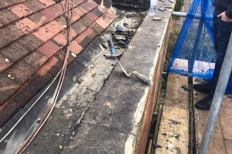 Brickwork and external wall before restoration by City Building and Roofing Ltd