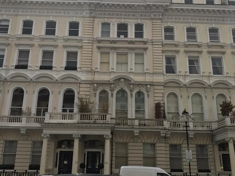 Exterior painting project before completion by City Building and Roofing Ltd